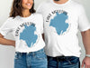 Two people wear white t-shirts with "Lake Moultrie South Carolina" map graphic.