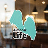 Turquoise map outlines on a sticker that says "Almanor Life" and "© Lake Lodge Media LLC".