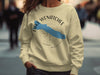 Light beige sweatshirt with blue Lake Wenatchee and compass graphic.