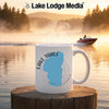 Mug with "Lake Tahoe California" text and map outline on a foggy lake background.
