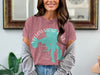Pink t-shirt with Yellowstone Lake map graphic and compass rose detail.