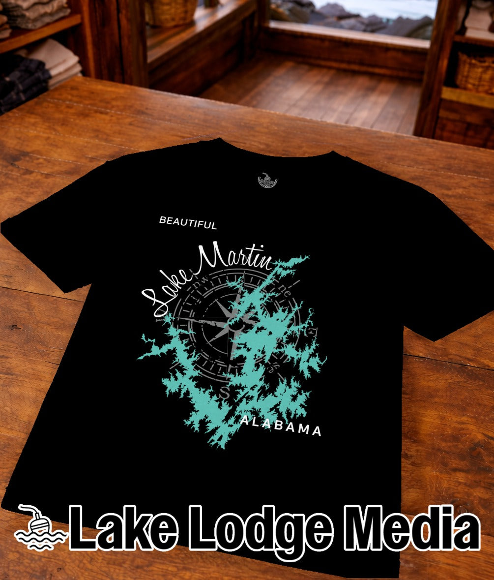 Black t-shirt with turquoise Lake Martin Alabama map and compass graphic.