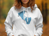 White hoodie with blue Sylvan Lake, South Dakota map and compass graphic.