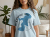 Light blue t-shirt featuring a blue map graphic with text "Canobie Lake New Hampshire".