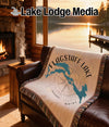 Flagstaff Lake Maine map on a woven blanket with a compass rose.