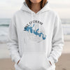 White hoodie with "Lake Cachuma California" map design and compass graphic.