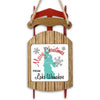 Sled ornament with "Merry Christmas from Lake Wauhoo" text and snowflake graphics.