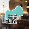 Sticker with turquoise state outline and text "Diamond Valley Life".
