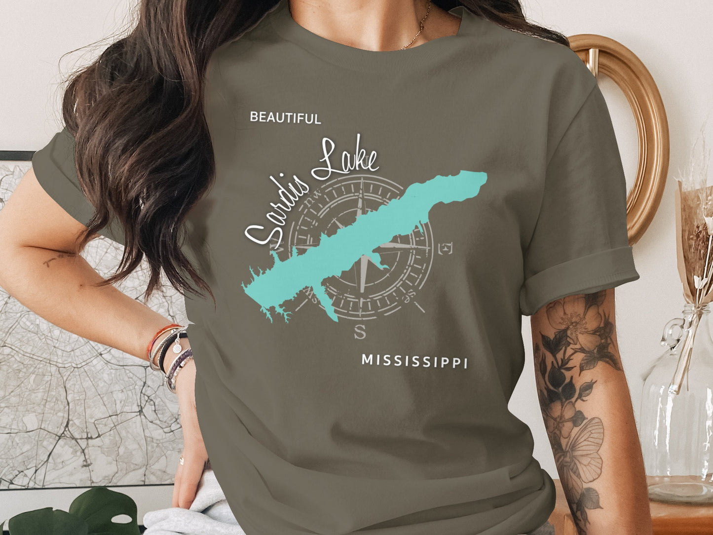 Sardis Lake Mississippi graphic on a dark olive green t-shirt.