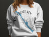 White sweatshirt with blue Longboat Key map and compass graphic with text.