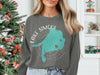 Dark gray sweatshirt with teal Lake Simcoe map and compass design.