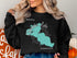 Black sweatshirt with "Beautiful Clearwater Lake Minnesota" map design.