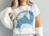 White t-shirt with Mendenhall Lake Alaska graphic and compass Rose design.
