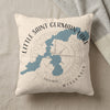 Cream pillow with blue Little Saint Germain Lake outline and compass design.