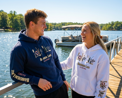Couple in hoodies by a lake with "BANKHEAD LAKE ALABAMA" text and graphic.