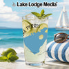 Glass of drink with lake map design, limes, mint, sunglasses, and sailboat background.
