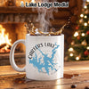 White mug with Carters Lake map and compass design, steamy coffee.