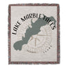 Lake Marble Falls Texas map on a fringed woven blanket.