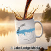 White mug with Enid Lake Mississippi map design, coffee pouring into it.
