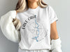 White t-shirt with "Lake Oahe North Dakota" text and compass graphic.