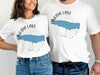 White t-shirts with "Oneida Lake New York" text and a blue lake graphic.