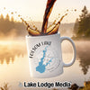 White Folsom Lake mug with map and compass design, coffee splash.