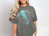 Gray t-shirt with turquoise Lake Winnipeg outline and compass design.