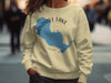 Sandhill Lake Wisconsin graphic on a cream sweatshirt.