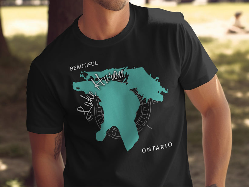 Black t-shirt with teal Lake Huron map and compass graphic.