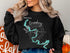 Black sweatshirt with Lake Granbury Texas map and compass graphic.