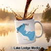 White mug with Sylvan Lake South Dakota map and compass graphic.