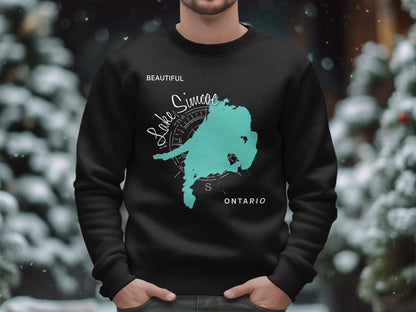 Black sweatshirt with a teal map of Lake Simcoe, Ontario.