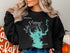 Black crewneck sweatshirt featuring a compass rose and map of Lake Pleasant, Arizona.