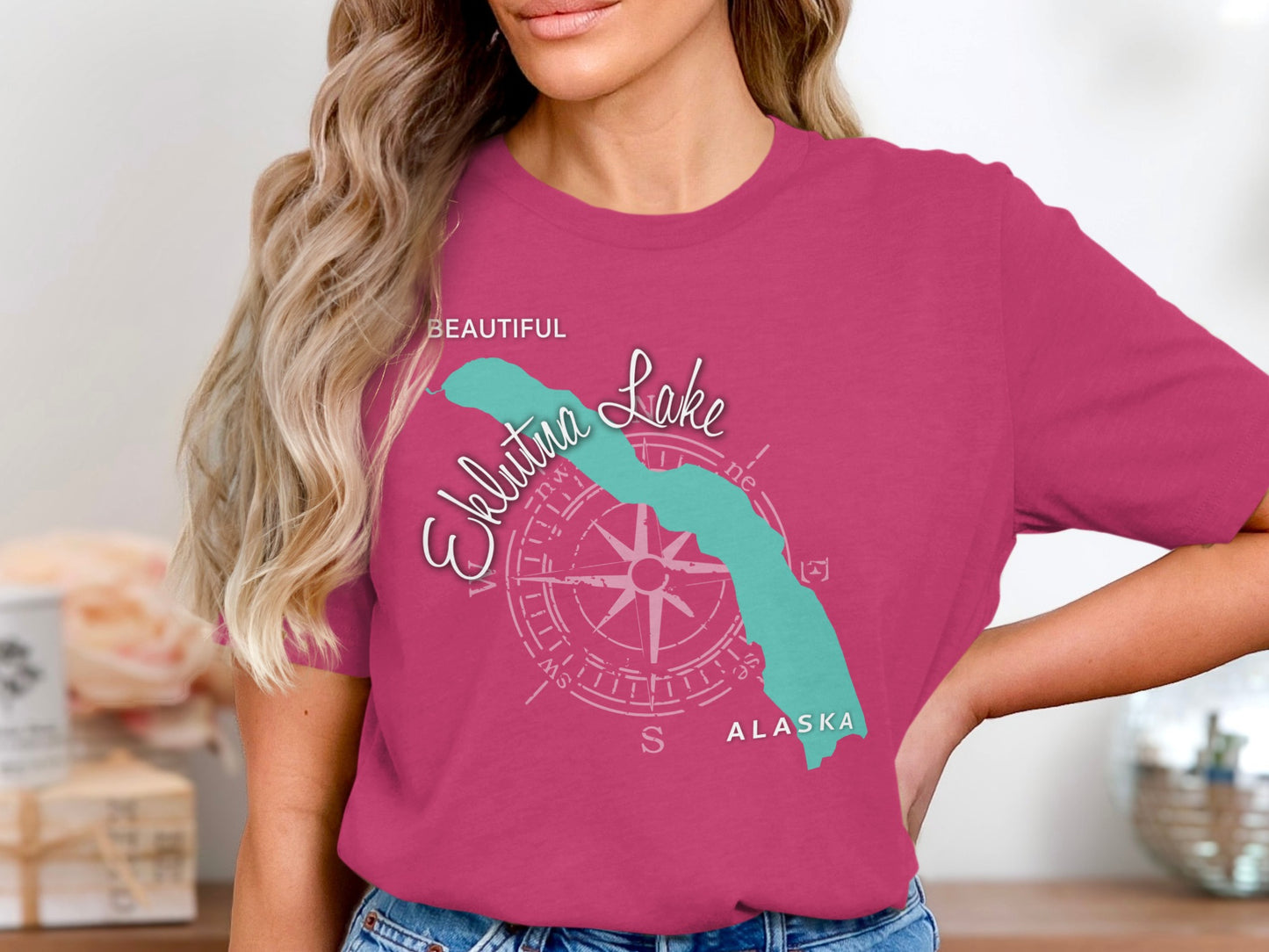 Eklutna Lake Alaska graphic on a magenta t-shirt.