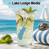 Glass with Saratoga Lake design, cocktail, and beach background.