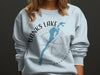 Light blue crewneck sweatshirt with Banks Lake map graphic and compass design.