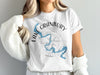 White t-shirt with a blue Lake Granbury map and compass design.