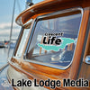Boat window with "Crescent Life" logo and "Lake Lodge Media" text.