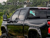 Black truck with "Lake Lodge Media" and "Clear Life" decals on rear window.