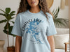 Light blue t-shirt with "Chatuge Lake" text, lake map, and compass design.