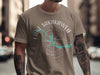 Taupe t-shirt with Lake Sakakawea, North Dakota map and compass design.