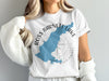 White t-shirt with blue outline of Ross Barnett Lake and compass graphic.