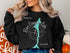 Black sweatshirt with turquoise Bear Canyon Lake Arizona compass graphic.
