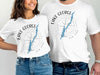 White t-shirts with "Lake George, New York" and a compass rose design.