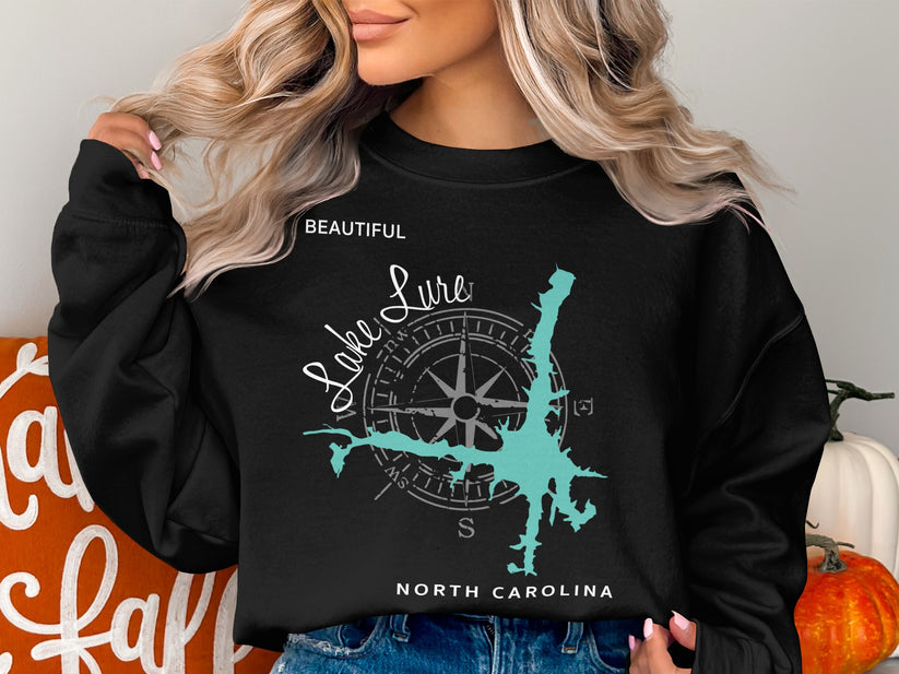 Black sweatshirt with "Lake Lure North Carolina" and compass design.