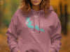 Pink hoodie with "Rainy Lake Minnesota" and compass design.