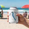 White koozie held by hand on a beach, displaying Lake Willoughby Vermont design.