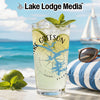 Glass with "Lake Greeson" and Arkansas map, beach background.