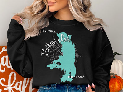 Black sweatshirt with "Beautiful Flathead Lake Montana" text and lake graphic.