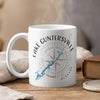White mug with Lake Guntersville map and compass design, steam rising.